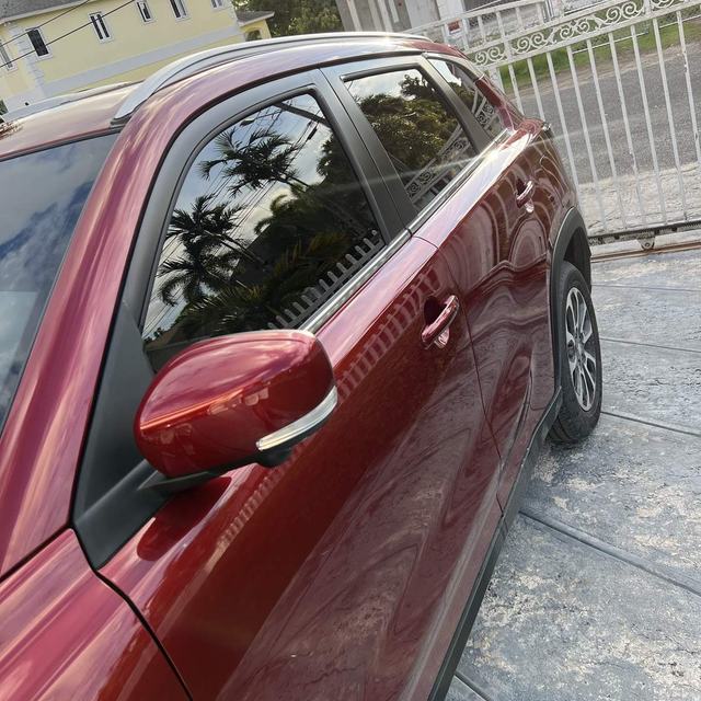 Red SUV with tinted windows