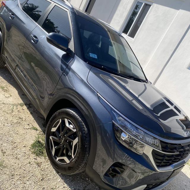 Dark blue SUV, tinted